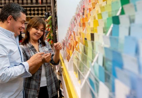 couple looking at paint swatches